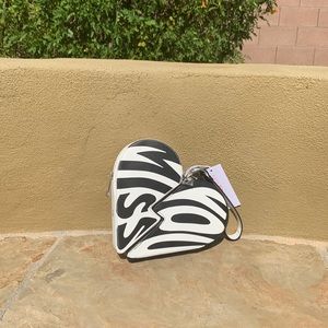 NWT Rare, super cute Katy Perry broken heart clutch wristlet.